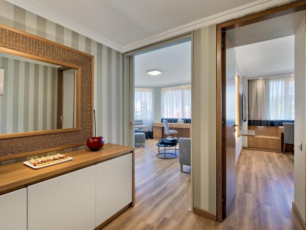 Divani Caravel : photo 3 de la chambre suite familiale divine (2 adultes + 2 enfants)