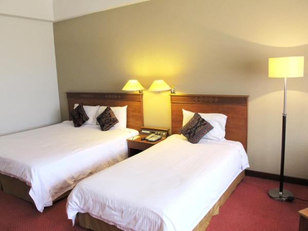 Hotel Grand Continental Kuching : photo 4 de la chambre chambre familiale deluxe