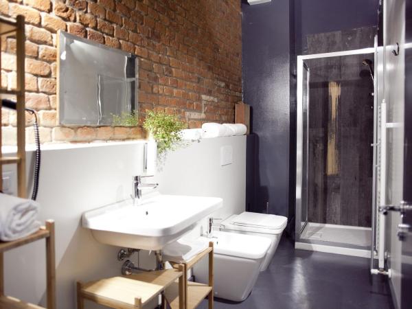 Pepita Lodge : photo 3 de la chambre chambre quadruple de luxe avec balcon