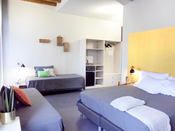 Pepita Lodge : photo 5 de la chambre chambre quadruple de luxe avec balcon