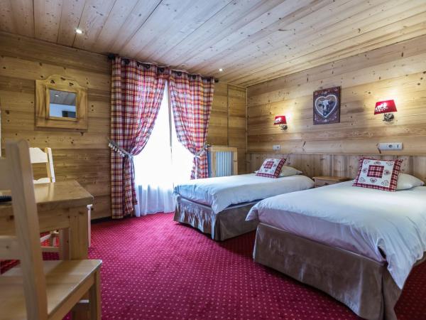 Hotel Alpina : photo 3 de la chambre chambre lits jumeaux