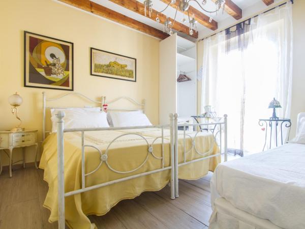 B&B Antico Cortile : photo 1 de la chambre chambre triple avec salle de bains privative