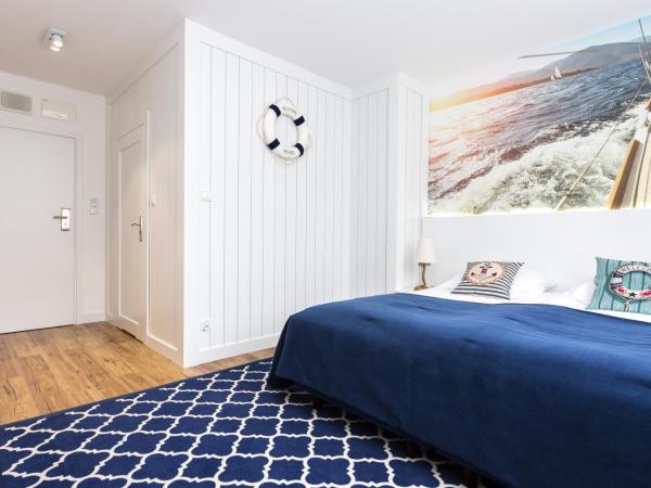 Błękitny Żagiel : photo 1 de la chambre chambre double ou lits jumeaux standard