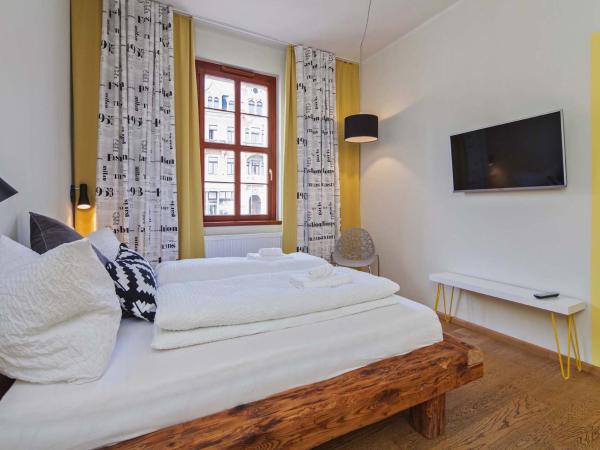Bed and Breakfast am Schillerplatz : photo 5 de la chambre chambre familiale