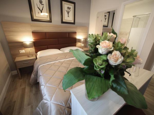 Alderotti Home : photo 8 de la chambre chambre familiale avec salle de bains privative