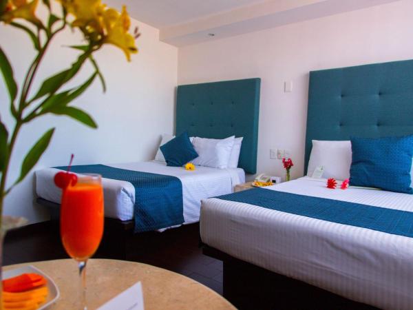 Hotel Real de Puebla : photo 1 de la chambre chambre double supérieure avec deux lits doubles