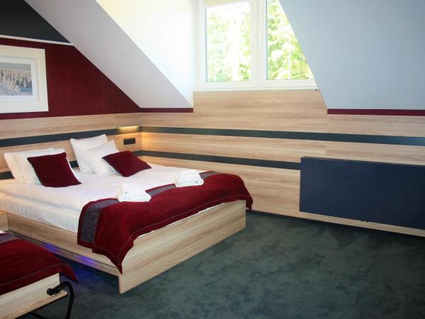 Villa Winterpol : photo 3 de la chambre chambre triple supérieure