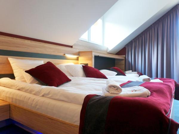 Villa Winterpol : photo 4 de la chambre chambre quadruple supérieure 