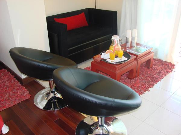 Zoom Apartments Hotel : photo 3 de la chambre suite lit king-size avec baignoire spa