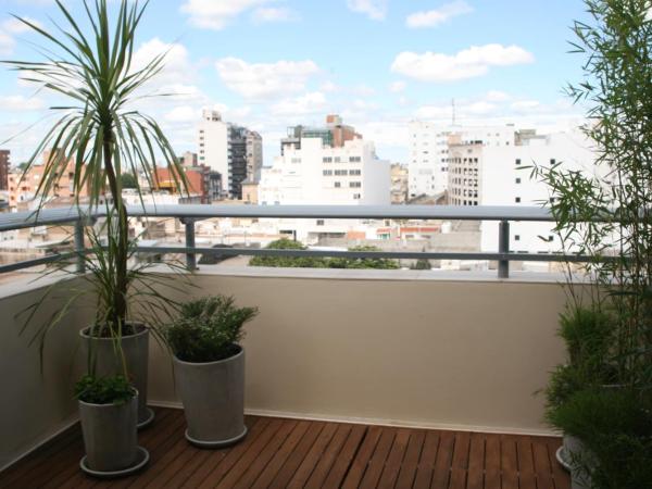 Zoom Apartments Hotel : photo 4 de la chambre suite lit king-size avec baignoire spa