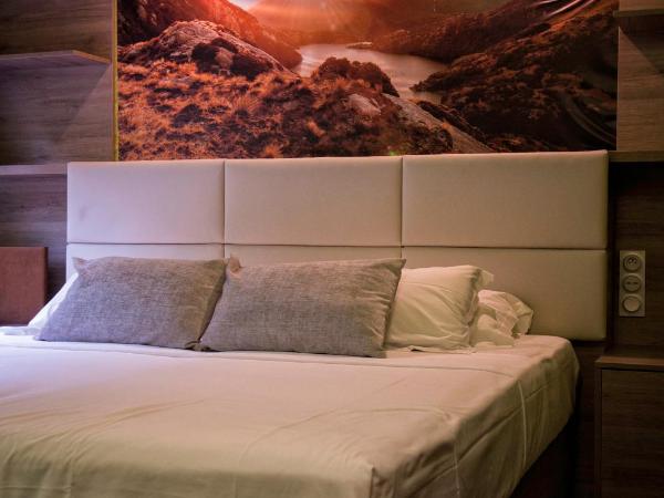 Hôtel La Rocade : photo 1 de la chambre chambre lit king-size deluxe