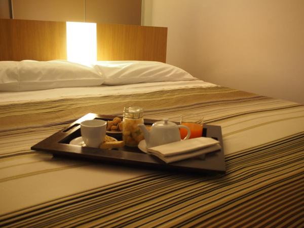 Parizzi Suites & Restaurant : photo 1 de la chambre appartement supérieur 1 chambre