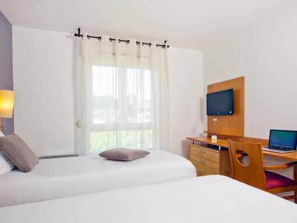 Séjours & Affaires Annecy Le Pont Neuf : photo 3 de la chambre studio