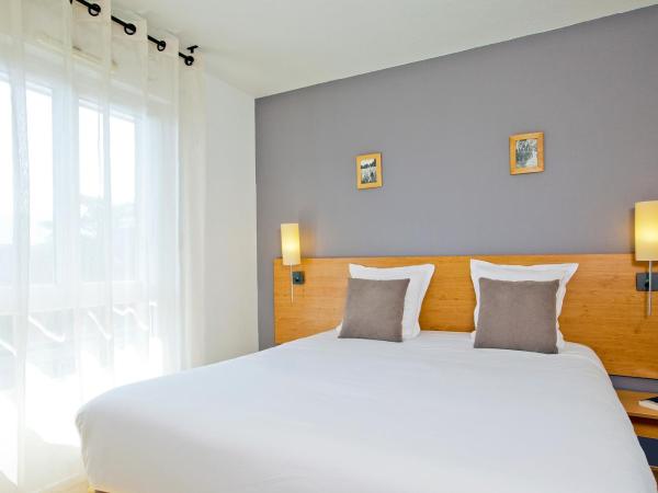 Séjours & Affaires Annecy Le Pont Neuf : photo 2 de la chambre studio