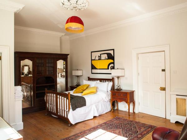 The Historical Harcourt Suites : photo 2 de la chambre chambre triple supérieure