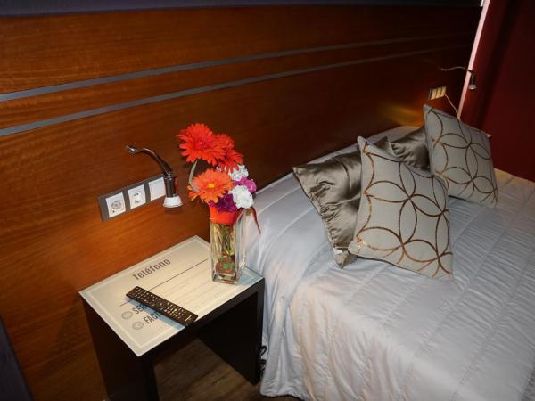 Motel Los Abedules : photo 2 de la chambre chambre lit queen-size 
