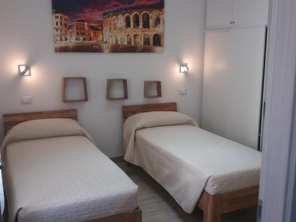 Vapama Rooms : photo 7 de la chambre chambre double ou lits jumeaux avec salle de bains privative
