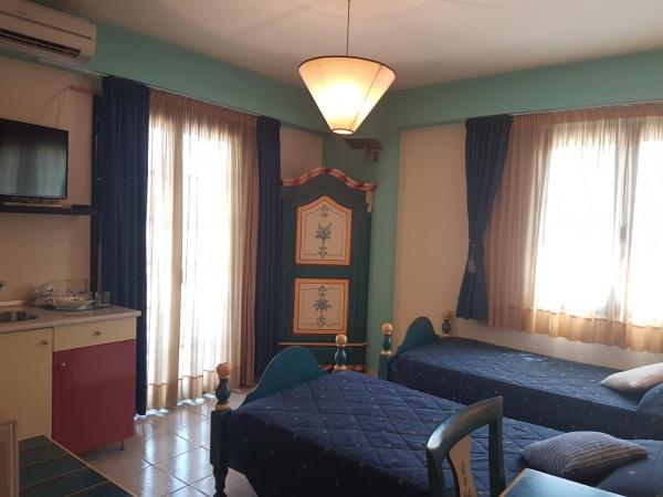 Yiannis Apartments : photo 1 de la chambre chambre lits jumeaux avec balcon