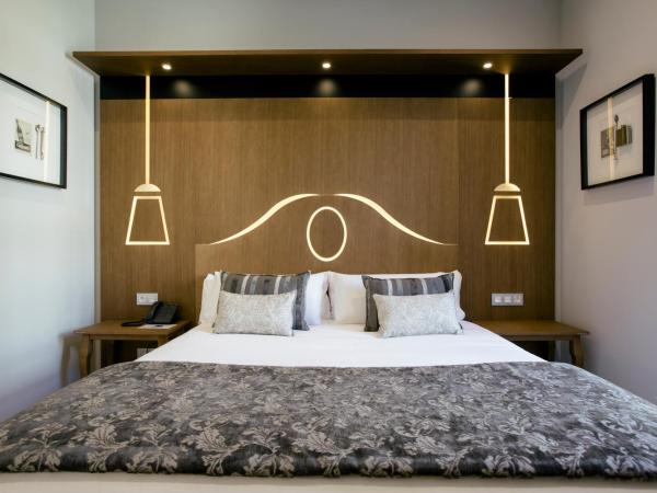 Legazpi Doce Rooms & Suites : photo 7 de la chambre appartement 3 chambres avec balcon