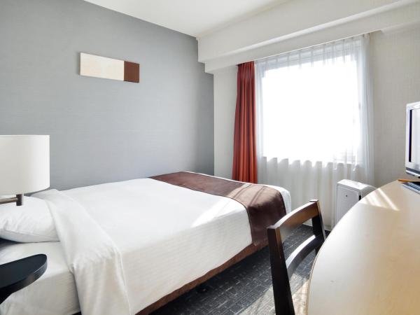 Sapporo Tokyu REI Hotel : photo 1 de la chambre chambre simple standard - fumeurs