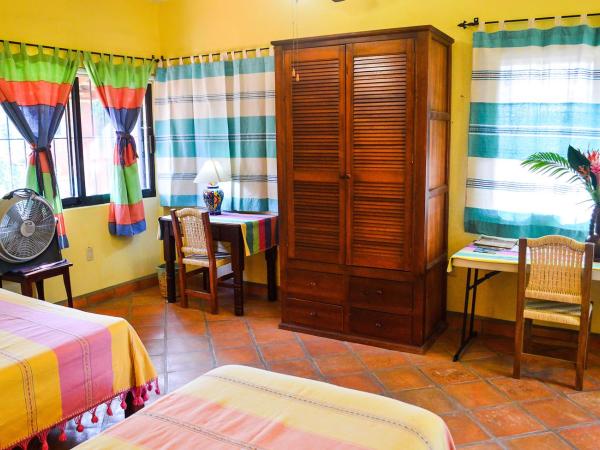 Hotel Casamar Suites : photo 2 de la chambre appartement - vue sur jardin / jacaranda