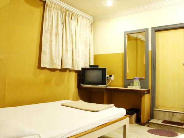 Greens Residency : photo 6 de la chambre chambre triple deluxe