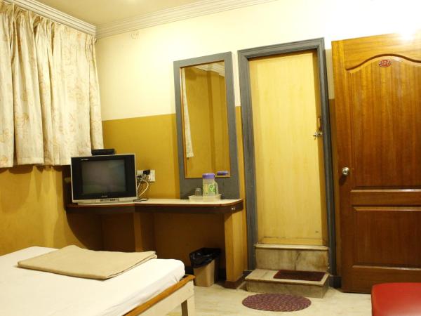 Greens Residency : photo 7 de la chambre chambre triple deluxe