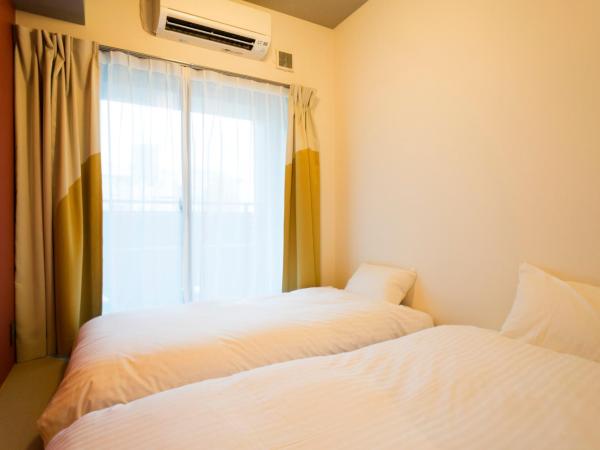 Imano Tokyo Ginza Hostel : photo 1 de la chambre chambre double ou lits jumeaux de style japonais