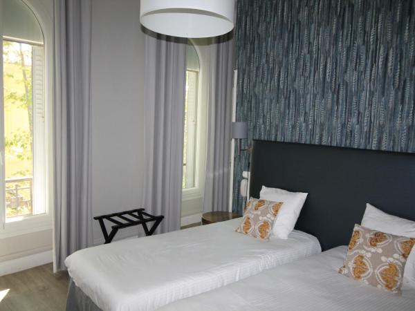 Régina Boutique Hotel : photo 8 de la chambre chambre lits jumeaux standard