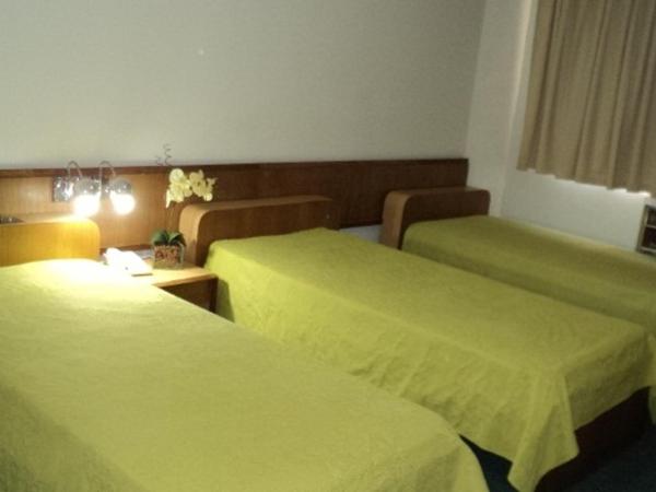 Rede Andrade San Martin : photo 6 de la chambre chambre triple standard avec 3 lits simples