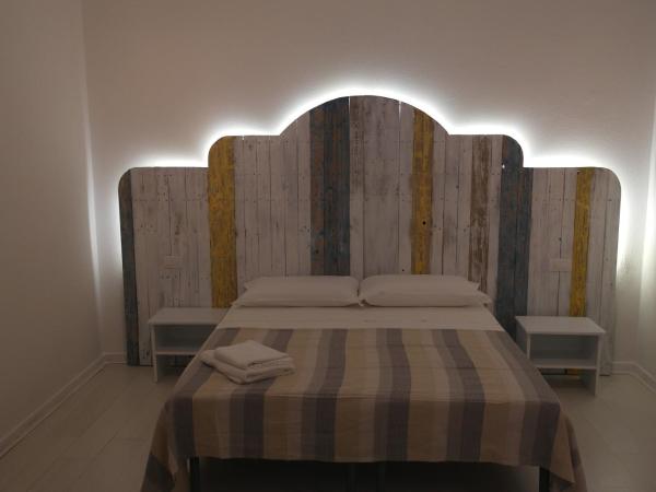 My Eco Rooms Olbia : photo 5 de la chambre chambre triple avec salle de bains privative séparée