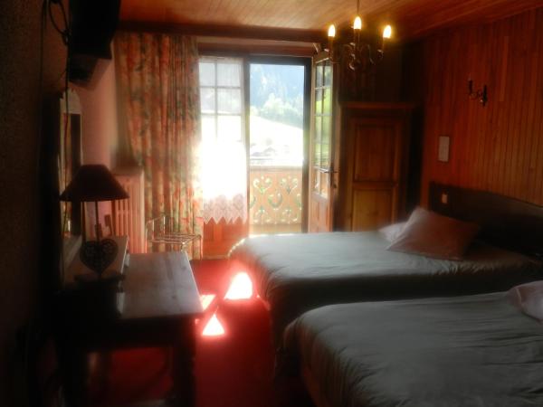 Chalet-Hôtel du Borderan : photo 1 de la chambre chambre quadruple