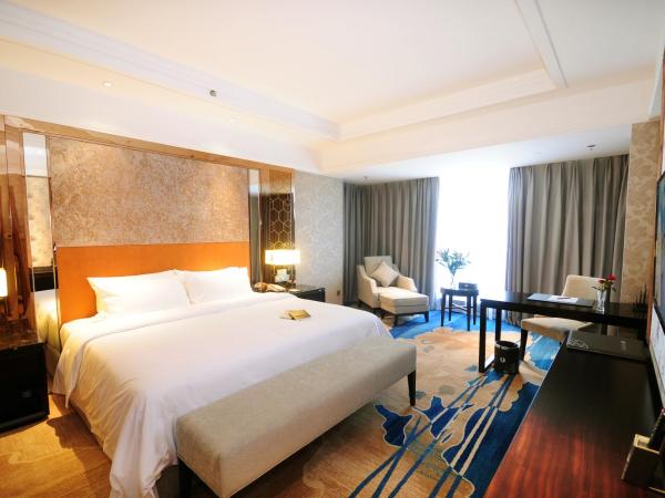 Airport Jianguo Hotel : photo 4 de la chambre suite affaires