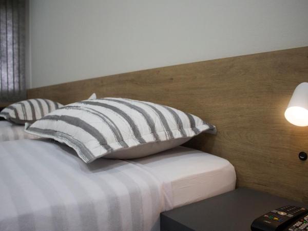 Hotel Dois Irmãos : photo 3 de la chambre chambre triple deluxe