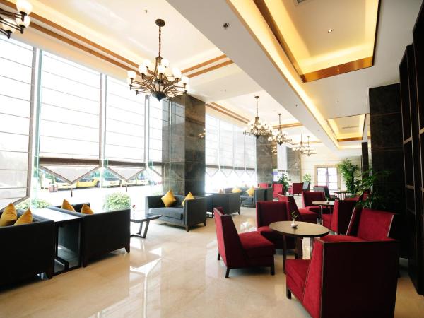 Airport Jianguo Hotel : photo 1 de la chambre chambre lits jumeaux supérieure