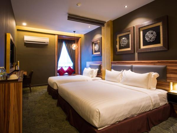 Asiatic Hotel : photo 1 de la chambre chambre triple deluxe