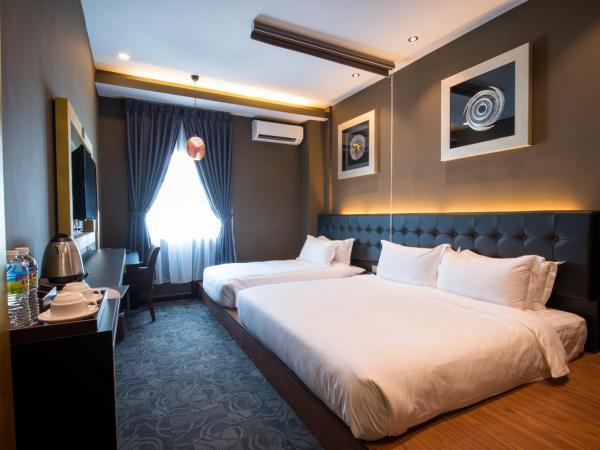 Asiatic Hotel : photo 7 de la chambre chambre triple deluxe
