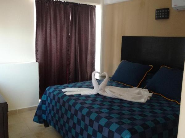 Hotel Puerto Inn : photo 6 de la chambre chambre standard lit queen-size