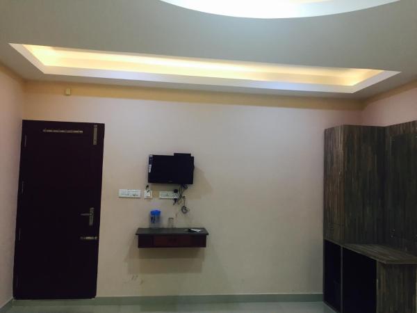 Mega Tourist Home Palarivattom : photo 4 de la chambre chambre double deluxe