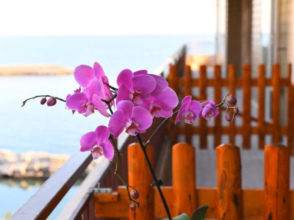 Attico 195 : photo 8 de la chambre chambre double deluxe avec balcon - vue sur mer