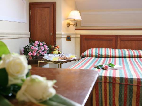 Hotel Arlecchino : photo 2 de la chambre chambre triple