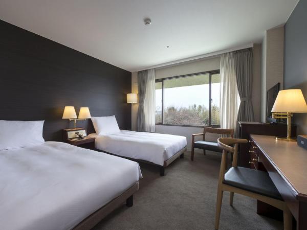Hilltop Resort Fukuoka : photo 1 de la chambre chambre lits jumeaux standard - vue sur montagne