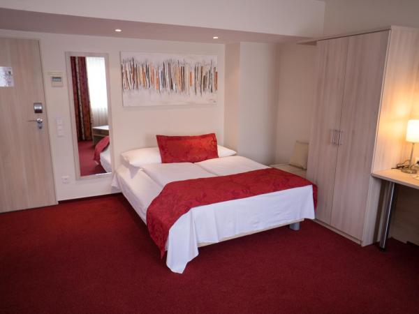 Hotel Rödelheimer Hof - Am Wasserturm : photo 7 de la chambre chambre familiale (4 adultes) 