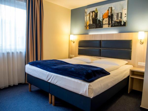 Hotel Rödelheimer Hof - Am Wasserturm : photo 2 de la chambre chambre double ou lits jumeaux