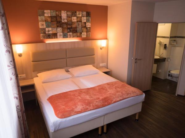 Hotel Rödelheimer Hof - Am Wasserturm : photo 1 de la chambre chambre double ou lits jumeaux