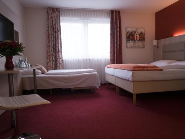 Hotel Rödelheimer Hof - Am Wasserturm : photo 3 de la chambre chambre triple