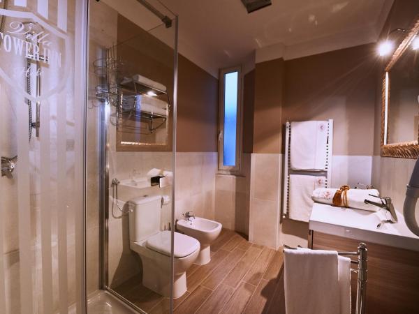 Villa Tower Inn : photo 3 de la chambre chambre triple familiale