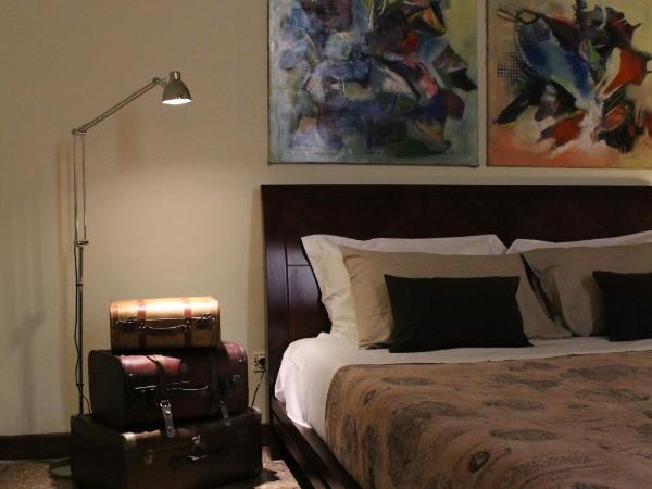 Rooms H Ercolani : photo 5 de la chambre chambre lit king-size standard avec salle de bains commune