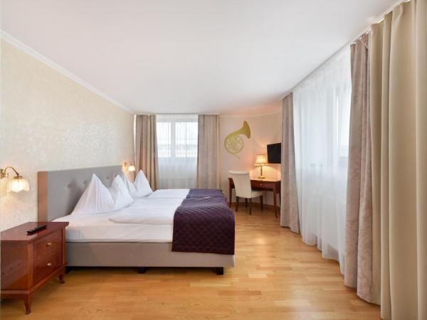 Hotel Am Schubertring : photo 2 de la chambre suite 2 chambres avec 2 salles de bains