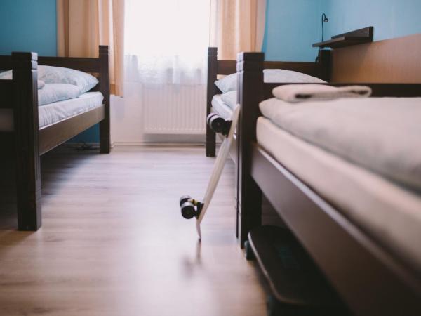 Hostel Dakura : photo 7 de la chambre chambre triple avec salle de bains commune